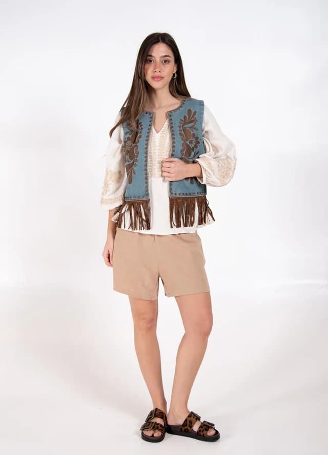 Chaleco denim con flecos